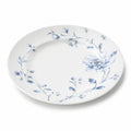 Piatto piano rotondo 27 cm in porcellana bianco e blu con motivo floreale